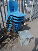 A set of eight tubular metal & plastic children's school chairs together with a small glass two-tier