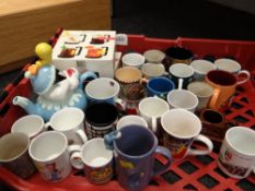 Crate of various coffee mugs & a novelty Disney Tweety Pie teapot