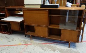A vintage Beaver & Tapley drinks cabinet together with a similar matching narrow bureau bookcase
