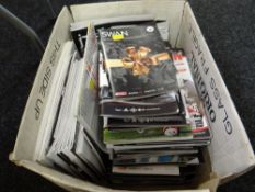 A collection of recent Swansea City football club match programmes