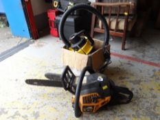 A McCulloch petrol chainsaw & an electric car buffer
