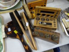 Three sets of boxed weights, clothes brushes etc