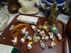 Brass model of a miner, collection of Tetley tea folk, vintage Dinky model car etc