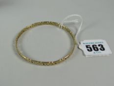 A 9ct gold Celtic design bangle