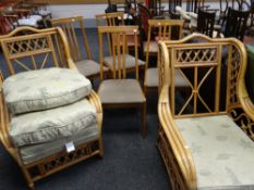 Four modern lightwood dining chairs together with two bamboo conservatory chairs