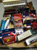 A collection of boxed diecast vehicles