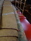 A large woollen floral decorated rug