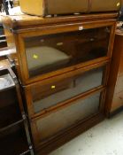 A good light oak three-section Globe Wernicke bookcase
