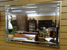 A modern bevel & gilt wall mirror