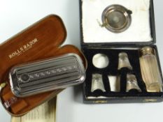 A part-cased communion set with hallmarked silver memorial plaque to box & boxed Rolls Razor
