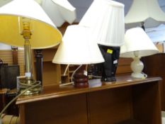 A parcel of seven various modern table lamps