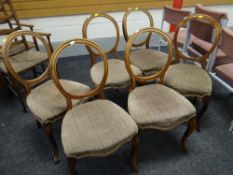 A set of six antique mahogany balloon back dining chairs