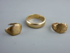 A NINE CARAT GOLD WEDDING BAND and two nine carat gold scrap rings, 9 grms, size 'X' and 5.7 grms