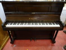 A MAHOGANY VINTAGE UPRIGHT PIANO, 115 cms high, 140 cms wide, 54 cms deep