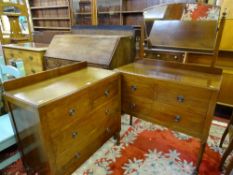 A CLEAN POLISHED TWO PIECE BEDROOM SET of mirrored chest and a chest of two short over two long