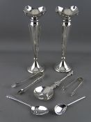 A PAIR OF SILVER TRUMPET VASES and a parcel of spoons and sugar tongs, the apostle spoon marked