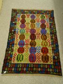 A CONTEMPORARY BALUCHI RUG with colourful block pattern central panel and wide border, 178 x 126