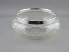 A SILVER RIMMED CUT GLASS FRUIT BOWL, Chester 1926, 20 cms diameter maximum