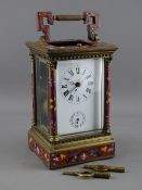 A FRENCH GILT BRASS & CHAMPLEVE ENAMEL REPEATING CARRIAGE CLOCK, the white dial set with Roman