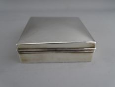 A NEAR SQUARE SILVER CIGARETTE BOX, Birmingham 1911, 9 x 9.25 cms
