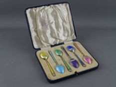 A CASED SET OF SIX SILVER & HARLEQUIN ENAMEL TEASPOONS, Birmingham 1932 & 1939, 2.4 troy ozs