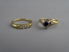 TWO NINE CARAT GOLD DRESS RINGS, one heart shaped with blue stone and the other with three tiny