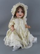 A HEUBACH KOPPELSDORF GERMAN BISQUE HEADED DOLL, no. 300.5, blue open/closing eyes, open mouth