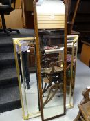 A vintage wall mirror & a modern fancy mirror