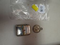 An early twentieth century silver vesta enamel decorated with a scene of a rower in action