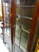 A good antique marquetry two-door standing china cabinet