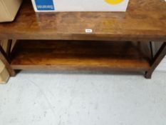 A modern two-tier Long John coffee table