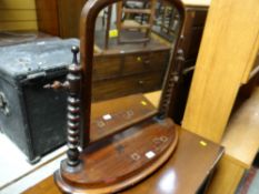 An antique barley-twist toilet mirror (distressed)