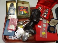 A parcel of mixed items including flatware, coinage, carved African bust etc