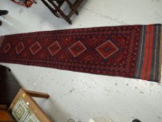 A red & blue coloured Meshwani runner, 280 x 60cms