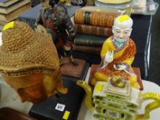 An Oriental bust with other figurines etc