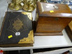 An antique brass bound Bible in Welsh together with a wooden letter rack