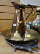 An EPNS footed tray, large brass ornamental charger, pair of candlesticks & copper jug