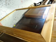 A pair of large pine framed mirrors