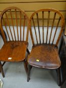 A pair of elm hoop back chairs