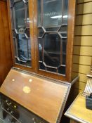 A vintage bureau bookcase