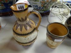 A Doulton Lambeth floral applied jug & similar silver rimmed hunting beaker