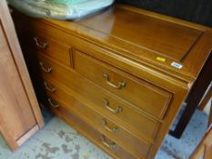 An Oriental hardwood chest of drawers, two-short above three-long