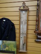 An Admiral Fitzroy barometer in a carved Gothic oak case