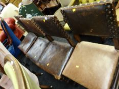 Set of four leather upholstered & studded dining chairs together with a barley-twist & carved back