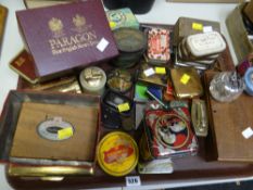 A large tray of ephemera relating to tobacco including tobacco tins, lighters etc