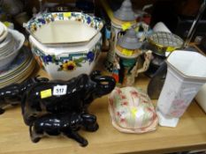 Pottery items including vases, continental steins, set of elephants