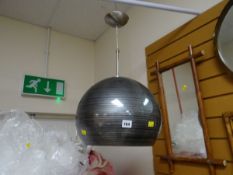 A contemporary satin metal & glass ceiling light