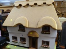 A good model doll's cottage with pseudo thatched roof