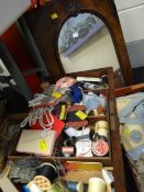 A wooden sewing box (distressed) together with contents & a walnut frame mirrored panel