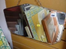 A vintage bevelled wall mirror